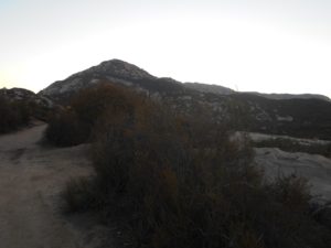 Looking forward on the trail, El Cajon Mountain beginning to become visible, though obscured by the more obvious peak in front (what appears as the tallest peak in this picture is not El Cajon Mountain!)