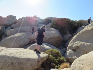 The group, climbing around on the boulders